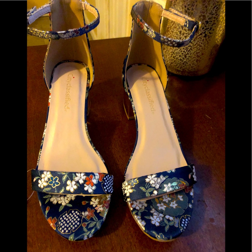 Cityclassified Sandal with 2” God heel.